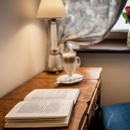 Hotel Grodek Kraków Exteriör bild A book on a table