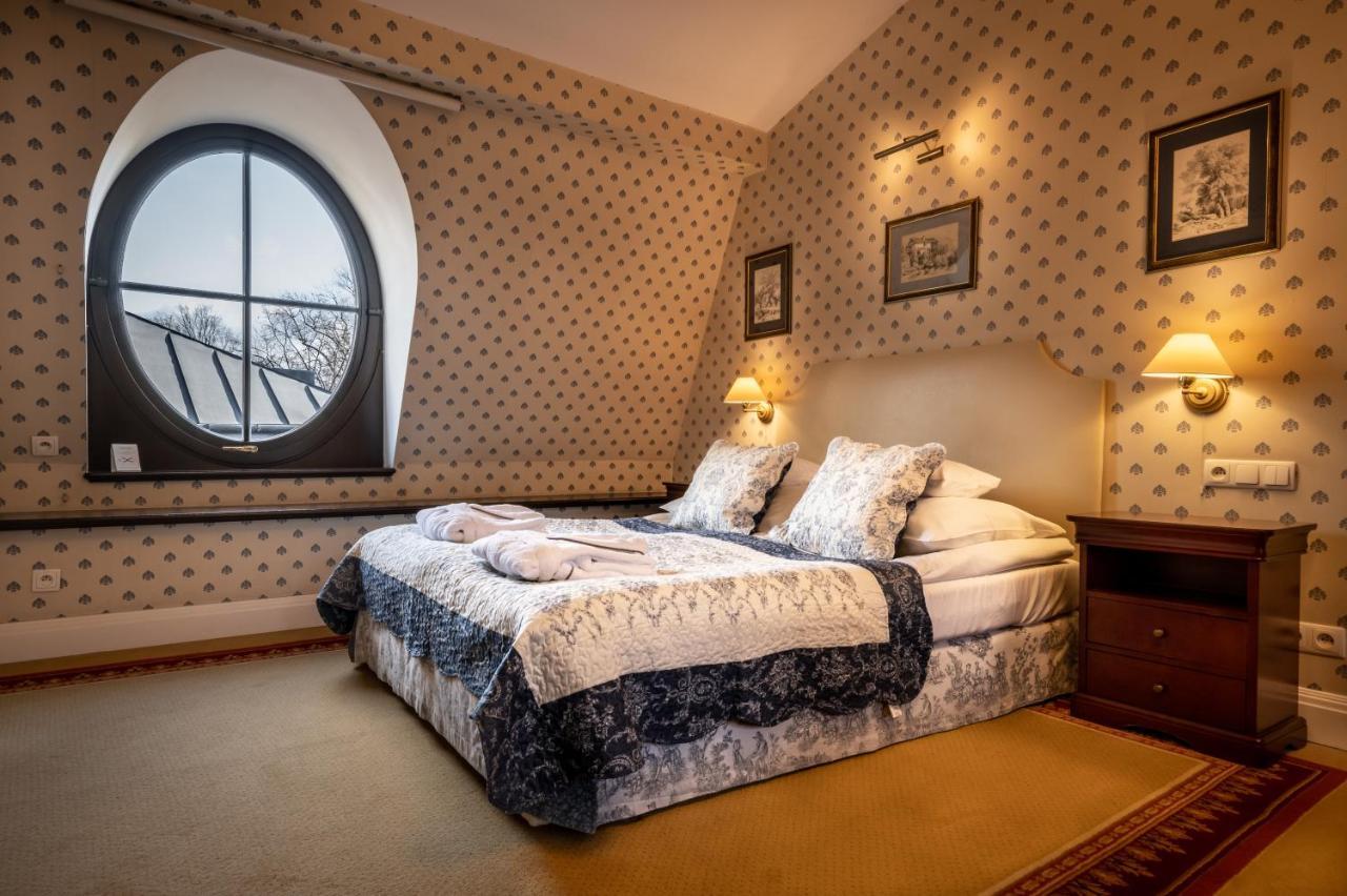 Hotel Grodek Kraków Exteriör bild A room at the hotel
