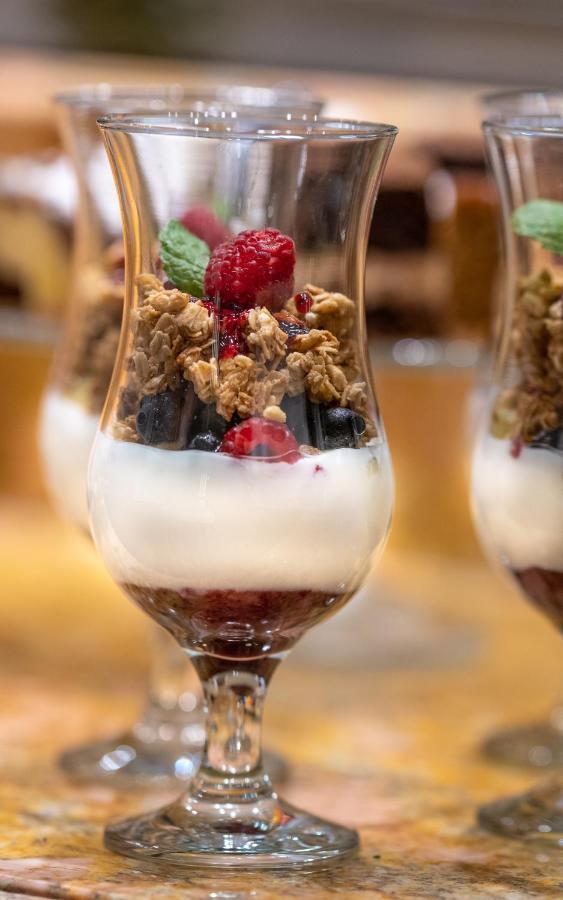Hotel Grodek Kraków Exteriör bild A parfait with granola and fruit