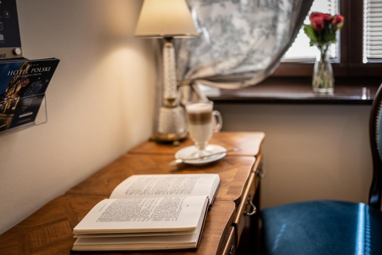 Hotel Grodek Kraków Exteriör bild A book on a table